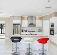 Central Gold Coast Large Modern Elevated Home - Accommodation in Brisbane