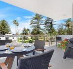 Bathers at the Beach across from Surf Beach - Accommodation in Brisbane