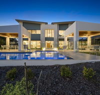 Luxury Canal Front Holiday House Raptor Pde Banksia Beach - Accommodation in Brisbane