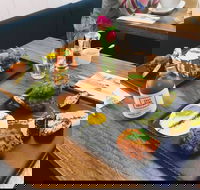 Between Us - Accommodation in Brisbane