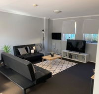 Cozy 3BR Townhouse in Liverpool CBD with parking - Accommodation in Brisbane