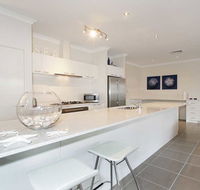 Penguin 4 Bedroom House by Shoalwater Executive Homes - Accommodation in Brisbane