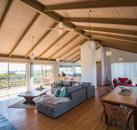 Sunsets on Martyrs Beach House - Ocean Views - Accommodation in Brisbane