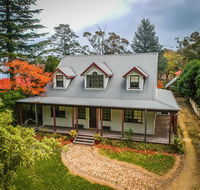 Whispering Pines Cottages - Accommodation in Brisbane