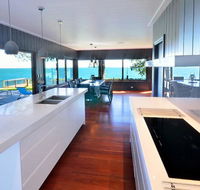 Dolphins at Sunset - Accommodation in Brisbane